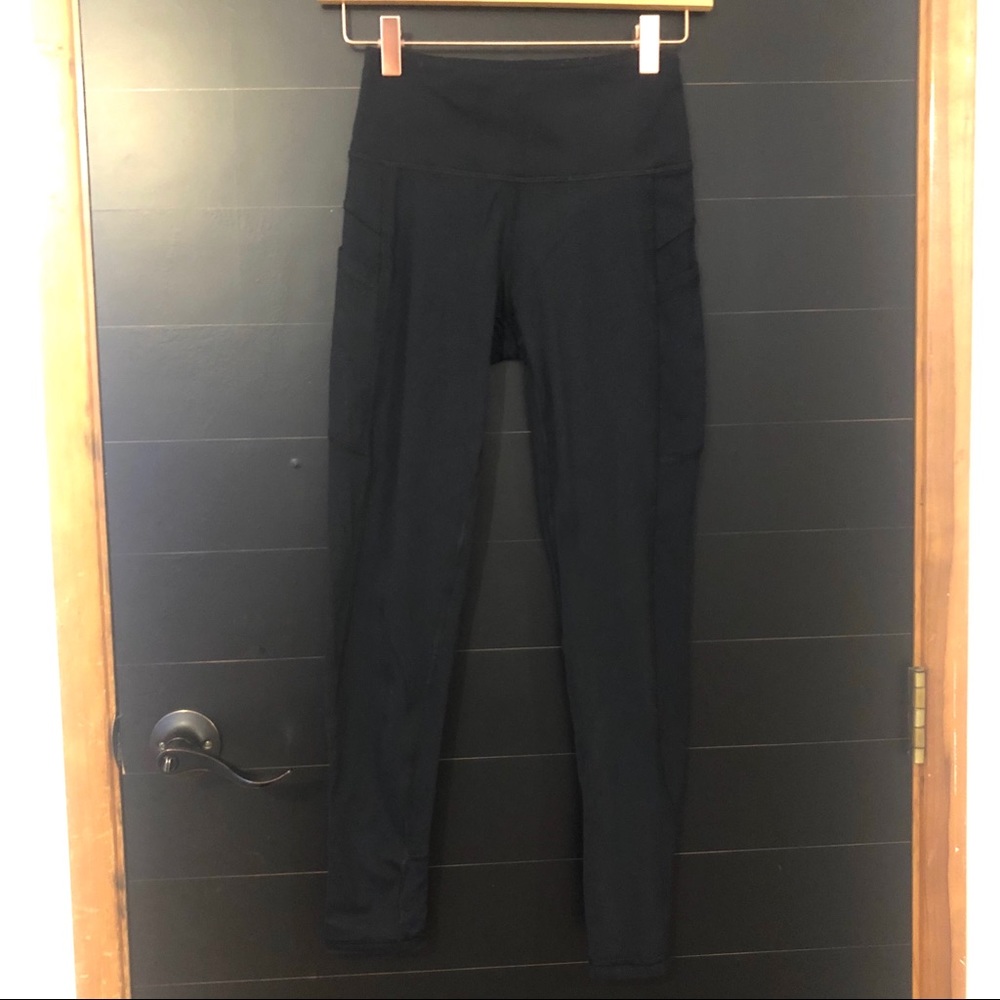 [x by gottex] black leggings.